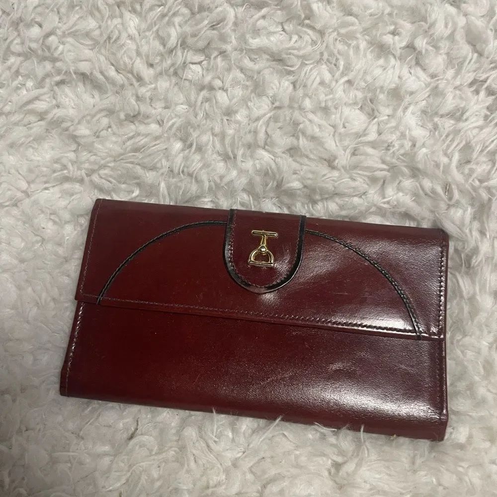 Baronet genuine leather 430 womens wallet gold tone accents and hardwares.